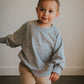 "His Love Endures" Embroidered Crewneck